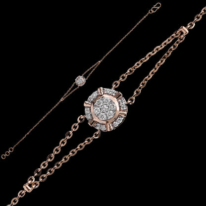 Elegant rose gold bracelet with a floral-inspired diamond centerpiece and dual-chain design from jnjbymadhuri, displayed on a black background.
