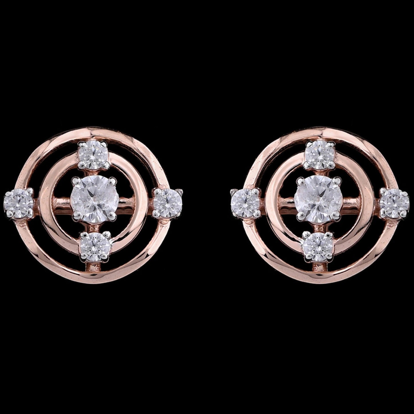 "Pair of rose gold circular stud earrings with concentric circle design, each featuring a central round diamond surrounded by smaller diamonds symmetrically spaced on the outer rings, displayed against a black background."
