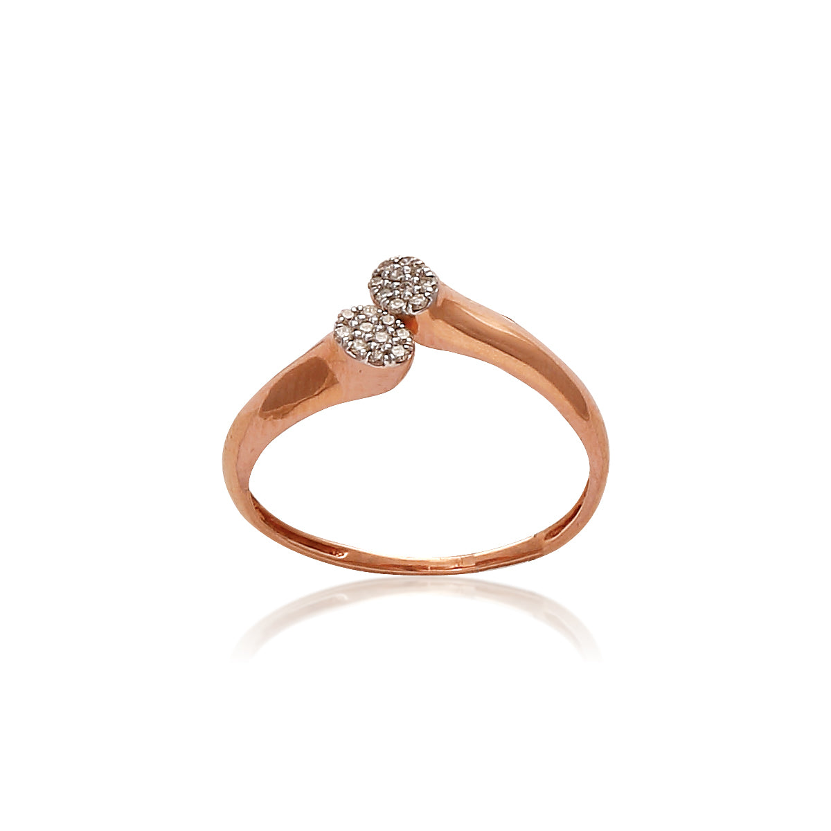 Minimal rose gold ring featuring two round diamond-studded ends that meet in a delicate embrace. A graceful and elegant design by jnjbymadhuri.
