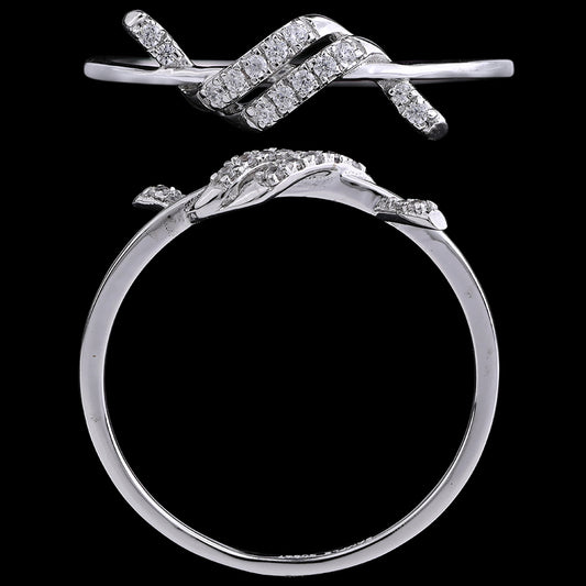 Elegant white gold ring featuring an abstract diamond-studded knot design, symbolizing unity and sophistication. A modern classic from jnjbymadhuri.
