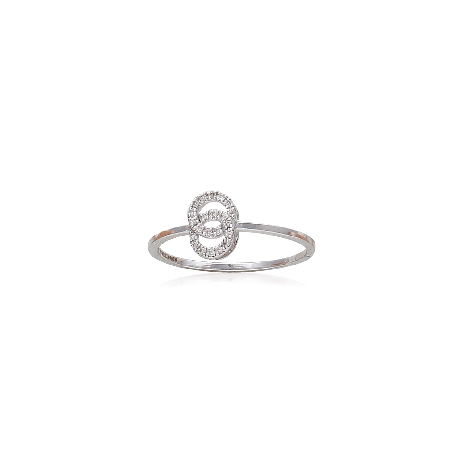 A delicate and contemporary silver ring featuring an open circular motif encrusted with sparkling stones, displayed against a clean white background to emphasize its elegance and minimalist charm by jnjbymadhuri.
