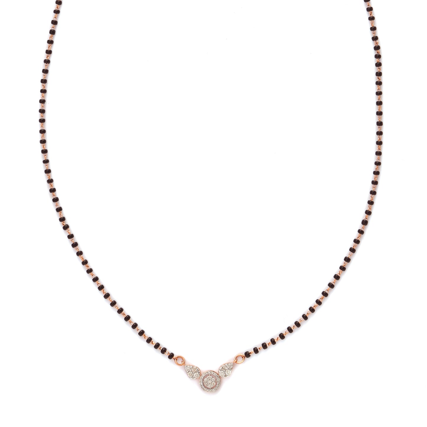 A modern take on tradition—this mangalsutra features a delicate black beaded chain with a minimalist diamond pendant at its center. A graceful and meaningful piece by jnjbymadhuri.
