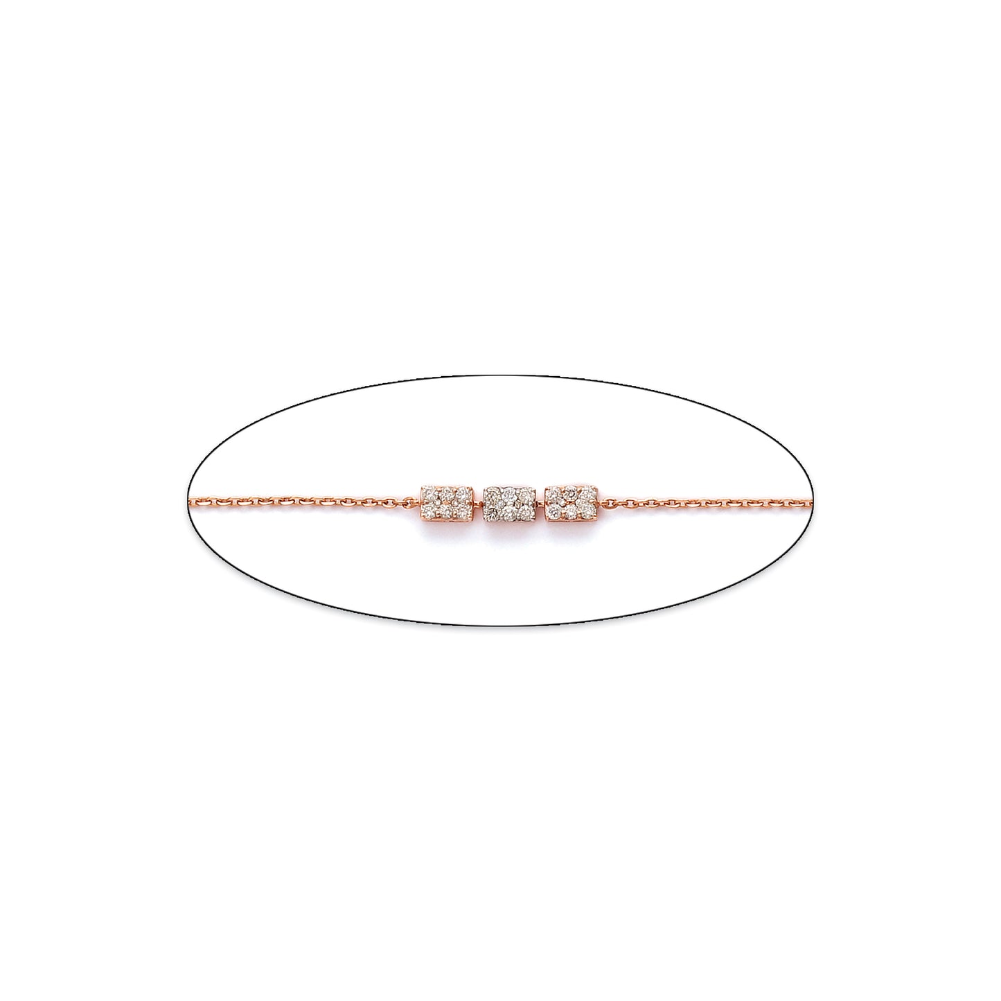 Minimalist bracelet from jnjbymadhuri featuring three sparkling cubic charms on a delicate rose gold chain, displayed on a white background.
