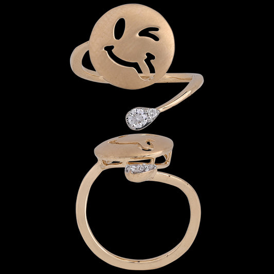 Whimsical gold ring featuring a winking smiley face and a teardrop-shaped diamond accent, radiating charm and fun. A signature creation by jnjbymadhuri.

