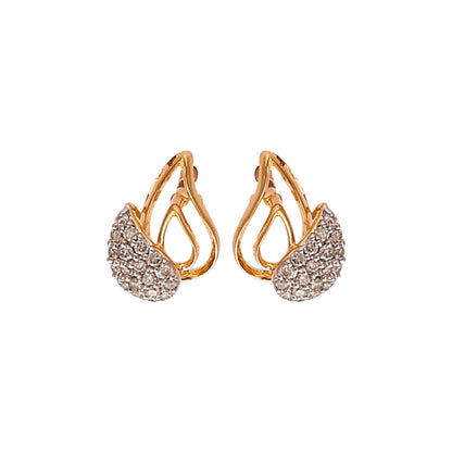 "Pair of gold teardrop-shaped stud earrings from jnjbymadhuri, featuring an open loop design with the lower portion encrusted with small white diamonds, displayed on a white background."
