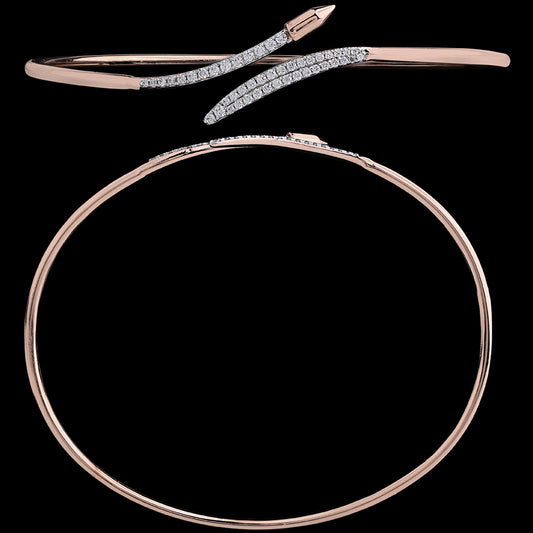 Stylish rose gold bangle with a sleek, crisscross diamond-studded motif for a modern touch by jnjbymadhuri.
