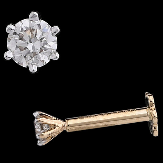 Classic round-cut solitaire diamond stud set in a timeless prong setting, exuding grace and sophistication. A signature masterpiece from jnjbymadhuri.
