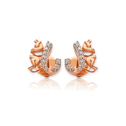 A pair of charming rose gold earrings from jnjbymadhuri, crafted in the shape of a playful cat nestled around a sparkling horseshoe design adorned with delicate white stones, blending whimsical elegance with luxurious detailing on a clean white background.
