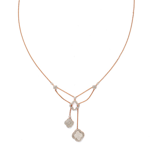 Delicate rose gold necklace featuring a dual-drop pendant design with diamond-studded geometric charms, created by jnjbymadhuri, displayed on a white background.
