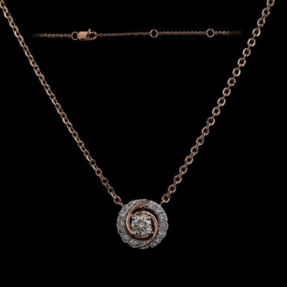 Stylish rose gold and diamond circular pendant necklace by jnjbymadhuri, displayed against a black background highlighting its intricate design and fine craftsmanship.
