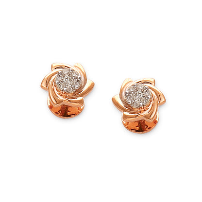 Charming rose gold stud earrings designed in a blooming floral pattern with a cluster of shimmering diamonds. A romantic and elegant creation by jnjbymadhuri.
