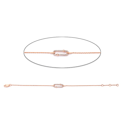 A delicate rose gold bracelet by jnjbymadhuri, showcasing a sleek, rectangular centerpiece encrusted with shimmering stones—an elegant and minimalist design ideal for everyday sophistication.
