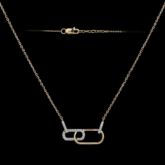 Minimalist dual-tone necklace featuring interlocking oval links in silver and gold, symbolizing unity and elegance. A subtle statement piece handcrafted by jnjbymadhuri for everyday sophistication.