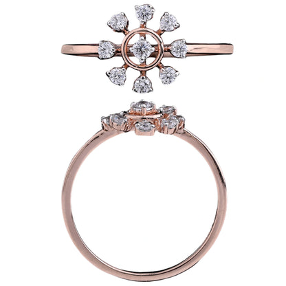 Rose gold ring with a central round diamond surrounded by eight smaller diamonds arranged in a starburst or floral pattern, shown from the top and side views.
