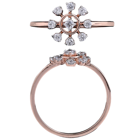 Rose gold ring with a central round diamond surrounded by eight smaller diamonds arranged in a starburst or floral pattern, shown from the top and side views.
