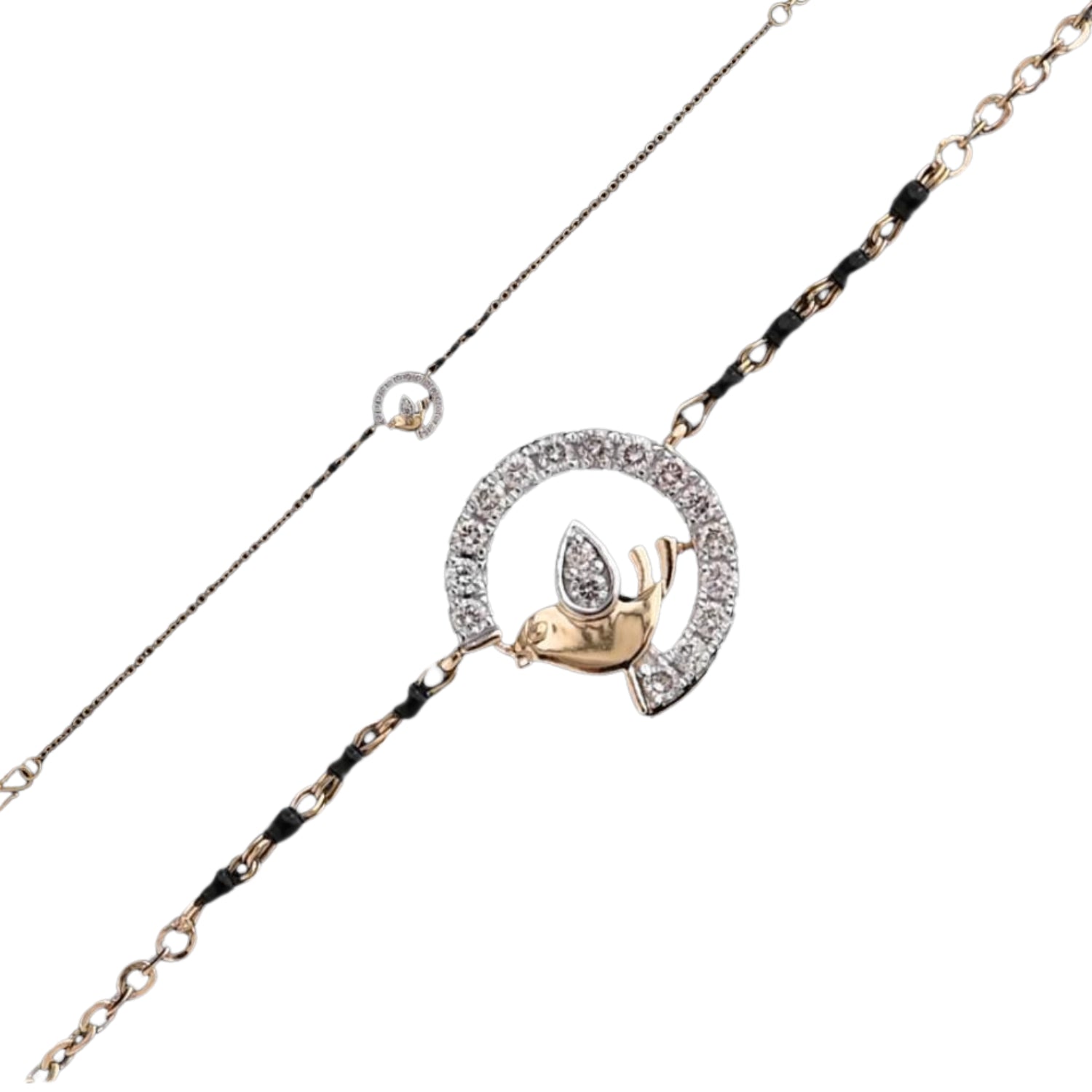 A charming bracelet by jnjbymadhuri, featuring a diamond-studded bird perched inside a sparkling semicircle on a two-tone chain. The design blends elegance and playfulness, accented with black beads for a unique, graceful touch.
