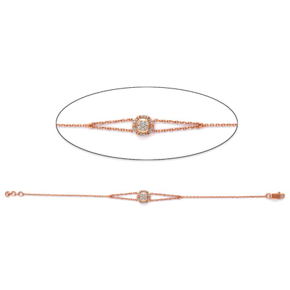 A delicate and sophisticated rose gold bracelet by jnjbymadhuri, featuring a circular centerpiece adorned with sparkling stones and flanked by intricate linear accents—blending timeless elegance with contemporary charm.
