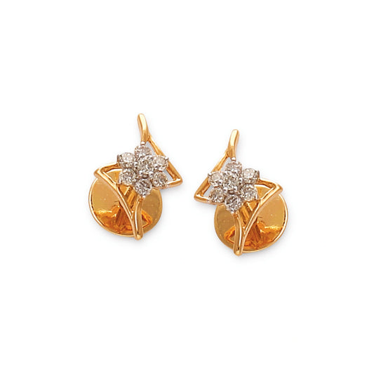 Gold-toned floral stud earrings by jnjbymaduri, featuring a radiant flower motif encrusted with diamonds, complemented by modern geometric detailing for a contemporary yet timeless appeal.

