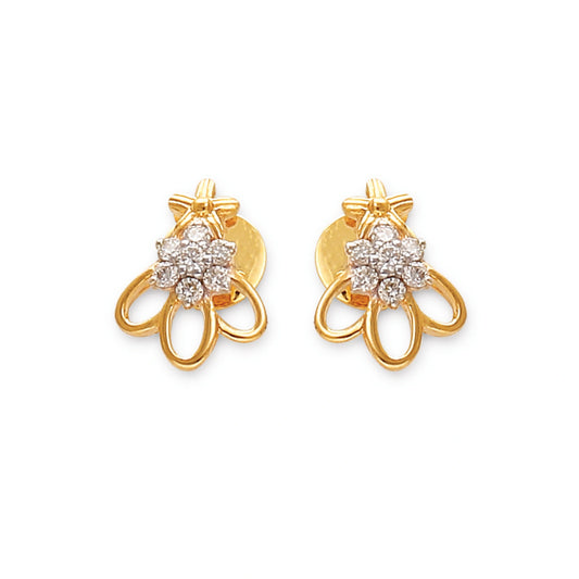 a pair of delicate gold earrings with floral diamond clusters and open petal-like loops — jewelry by jnjbymadhuri.
