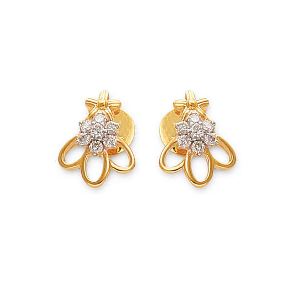 a pair of delicate gold earrings with floral diamond clusters and open petal-like loops — jewelry by jnjbymadhuri.
