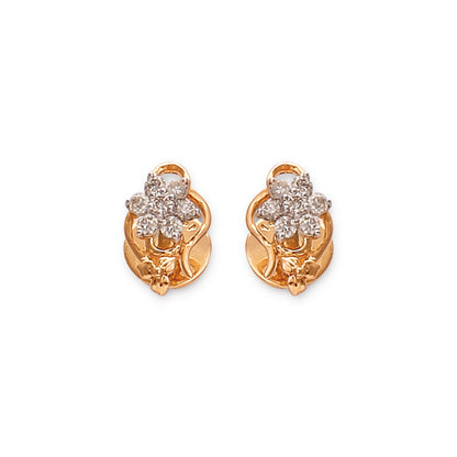 Gold floral diamond stud earrings by jnjbymaduri, featuring a delicate cluster design crafted from polished gold and sparkling diamonds, offering an elegant and versatile accessory for any occasion.
