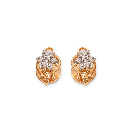 Gold floral diamond stud earrings by jnjbymaduri, featuring a delicate cluster design crafted from polished gold and sparkling diamonds, offering an elegant and versatile accessory for any occasion.

