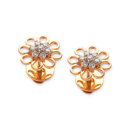 Elegant floral gold earrings by jnjbymadhuri, featuring open petal loops adorned with shimmering diamonds at the center, offering a perfect blend of traditional charm and modern finesse.
