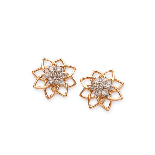 Elegant floral stud earrings featuring a delicate open-petal design accented with sparkling diamonds—this timeless piece by jnjbymadhuri blends modern finesse with traditional charm.

