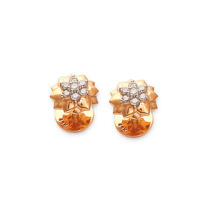 Elegant floral stud earrings crafted in gold with a sparkling diamond cluster at the center, showcasing timeless charm and sophistication by jnjbymadhuri.
