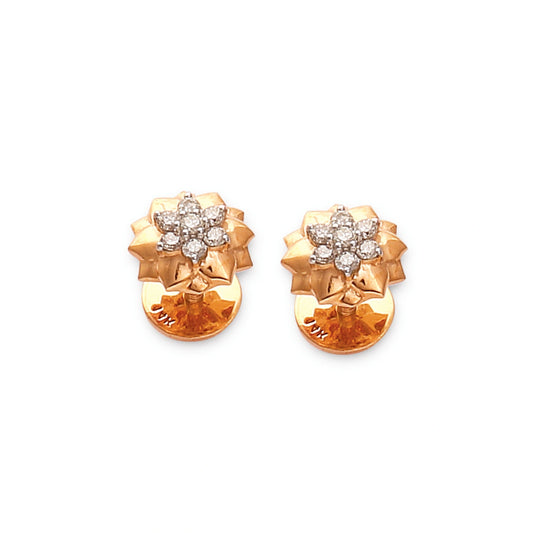 Elegant floral stud earrings crafted in gold with a sparkling diamond cluster at the center, showcasing timeless charm and sophistication by jnjbymadhuri.
