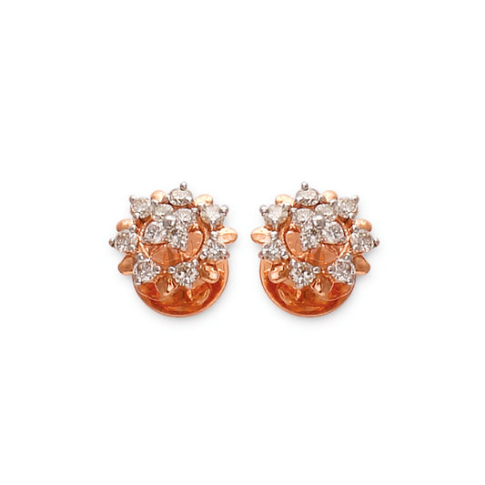 a pair of rose gold floral stud earrings with clustered diamonds arranged in a petal design — jewelry by jnjbymadhuri.