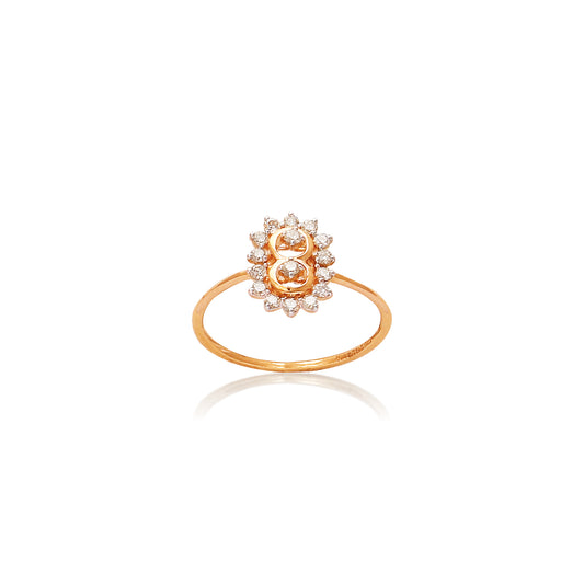 Delicate gold floral ring by jnjbymadhuri, featuring a central gemstone surrounded by a halo of shimmering diamonds in a blooming lotus design.
