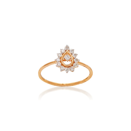 Gold ring featuring a central teardrop-shaped diamond surrounded by a halo of small marquise diamonds arranged in a floral pattern, displayed on a white background with a soft reflection.
