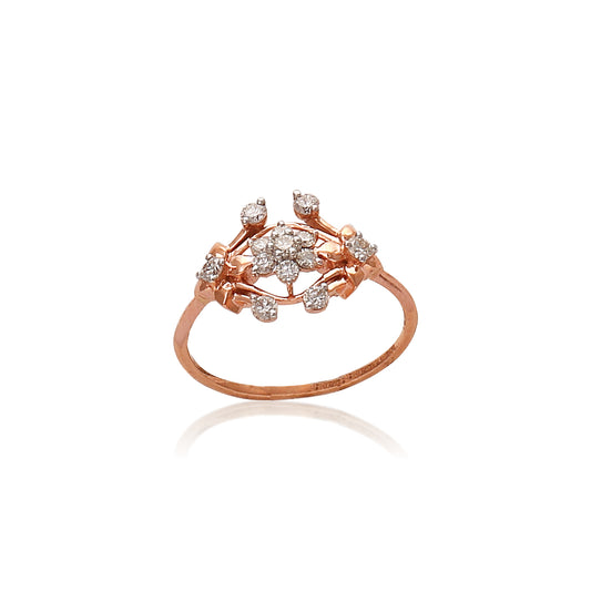 Rose gold ring with a central cluster of round-cut diamonds, accented by delicate diamond-studded leaf motifs on each side, displayed on a white background with soft reflection.
