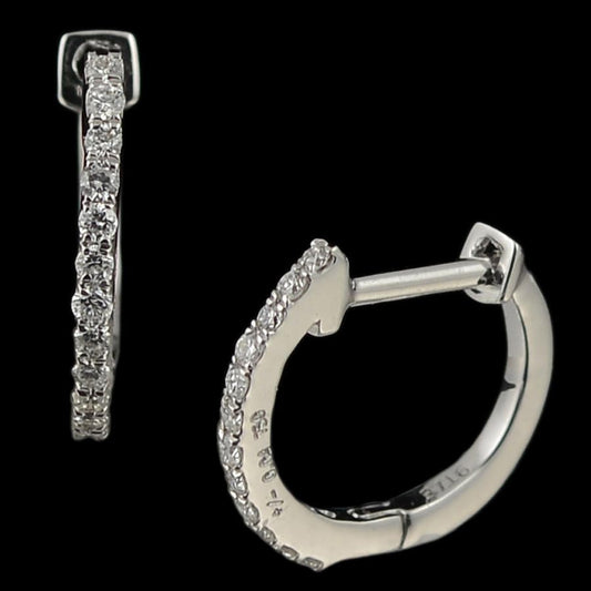 Sleek and elegant diamond-studded white gold hoop earrings by jnjbymadhuri, crafted for a refined and timeless look. Perfect for everyday sophistication or evening glamour.