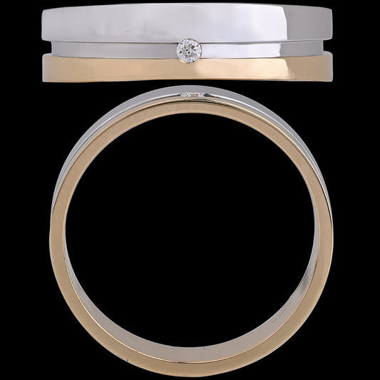 A modern dual-tone ring with a high-polish silver band accented by a single diamond and a sleek gold underlay. Elegant craftsmanship meets minimal style by jnjbymadhuri.
