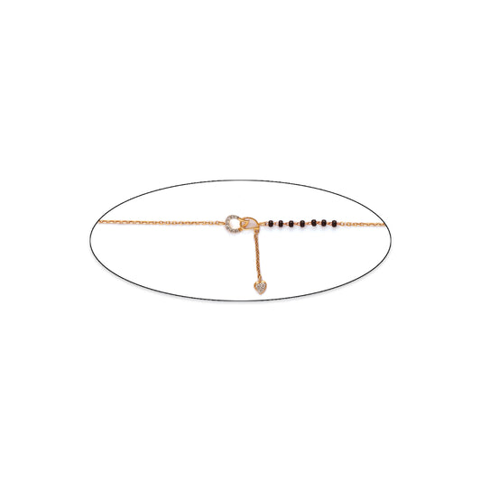 Delicate rose gold mangalsutra chain featuring a minimalist clasp design and a row of small black beads. A subtle yet elegant everyday essential by jnjbymadhuri.
