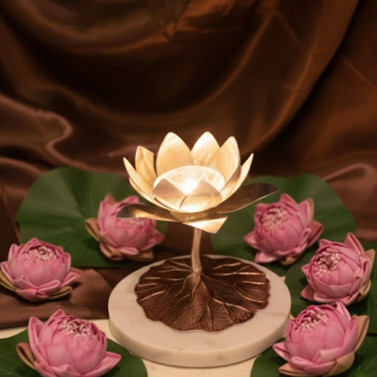 Marble Lotus Diya by JNJ by Madhuri, a beautifully crafted lotus-shaped marble diya designed for pooja, home temple, and festive rituals.