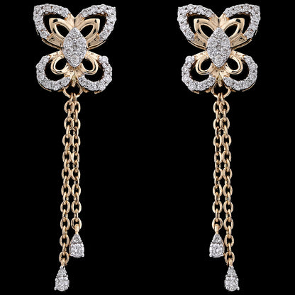 These butterfly-inspired earrings dazzle with intricate diamond settings and graceful drop chains, capturing the signature charm of jnjbymadhuri.
