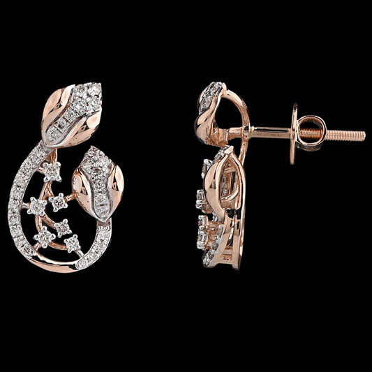 These stunning rose gold earrings feature a graceful teardrop design adorned with diamond-studded leaves and delicate vines, blending nature-inspired elegance with fine craftsmanship — a signature style of jnjbymadhuri.
