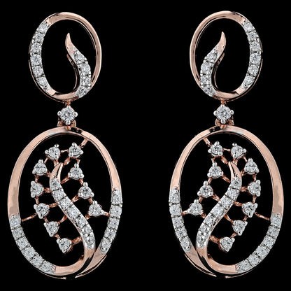 Elegant oval earrings in rose gold featuring a sparkling diamond swirl and intricate lattice design. A refined statement from jnjbymadhuri.
