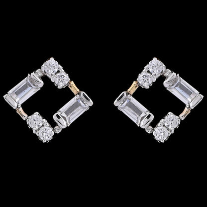 Geometric diamond stud earrings crafted in a square silhouette with alternating baguette and round diamonds. A bold and modern design by jnjbymadhuri.