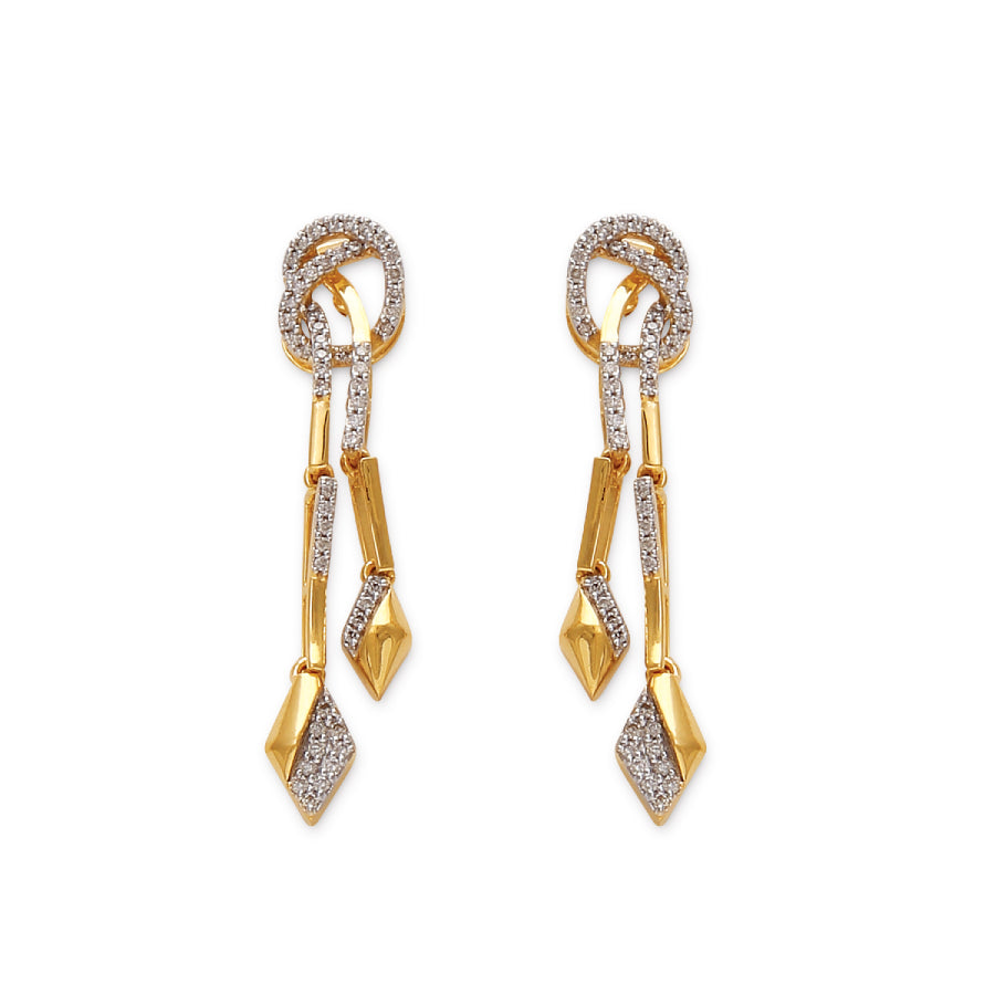 Contemporary gold and diamond drop earrings with geometric accents and dual dangling elements for a bold, modern look. An artistic creation by jnjbymadhuri.
