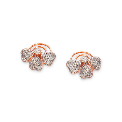 Elegant heart-petal earrings in rose gold, accented with sparkling diamonds forming a floral motif. A graceful and timeless piece by jnjbymadhuri.
