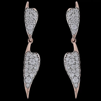 Elegant double-drop earrings by jnjbymadhuri, featuring leaf-shaped elements adorned with brilliant white stones in a rose gold finish. These timeless pieces by jnjbymadhuri exude sophistication and modern charm.

