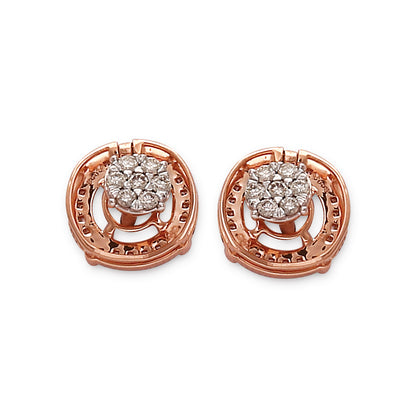 Elegant rose gold earrings with a sparkling diamond cluster at the center, framed by an intricate circular design. A timeless piece from jnjbymadhuri.
