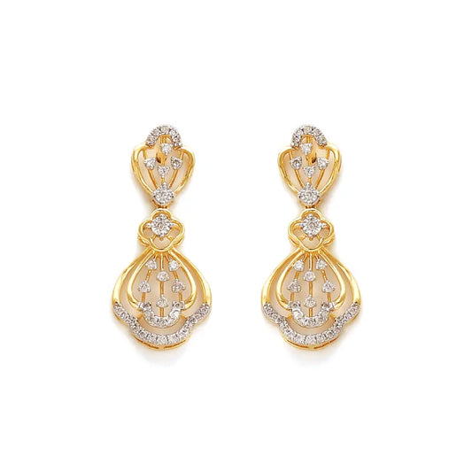 Graceful gold drop earrings adorned with intricate diamond accents in a floral-inspired design. A radiant statement piece from jnjbymadhuri.
