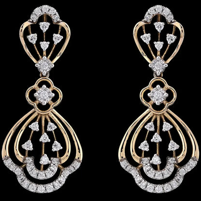 Elegant gold drop earrings featuring a cascading heart-shaped design with shimmering diamonds. A luxurious and timeless accessory by jnjbymadhuri.
