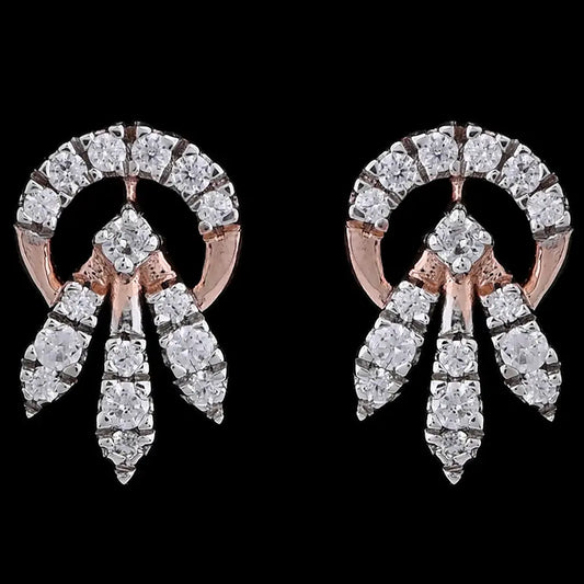 Dazzling rose gold stud earrings adorned with clustered diamonds in a radiant circular design. A luxurious creation by jnjbymadhuri.
