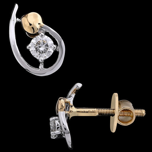 Chic two-tone gold earrings featuring a sleek teardrop design with a sparkling central diamond. A graceful blend of elegance and modern charm by jnjbymadhuri.
